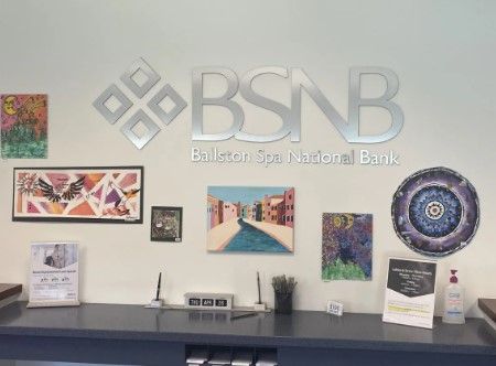 Curate and organize an exhibit of art created by our clients