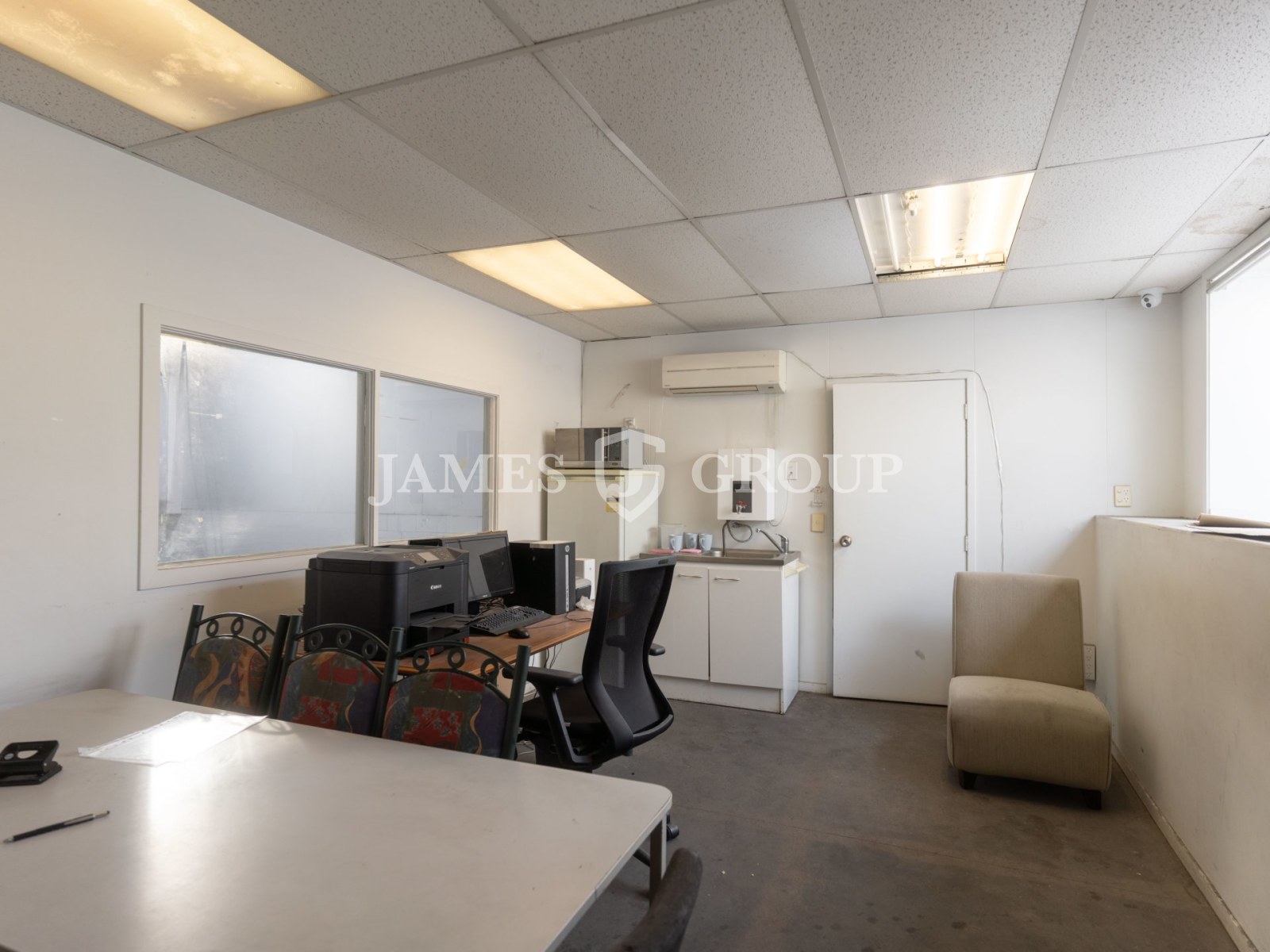 Tidy Industrial Space With Minimal Office